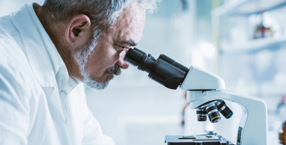 Doctor with microscope