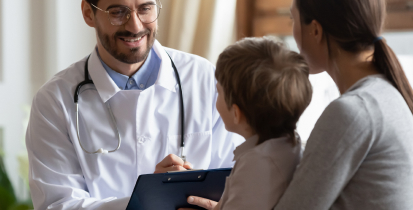 Doctor consulting mother and son